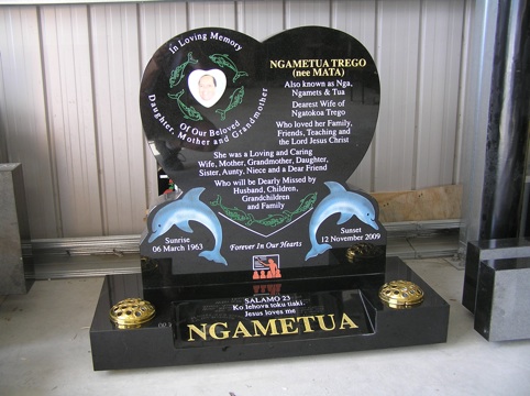 raised heart with dolphins artwork headstone